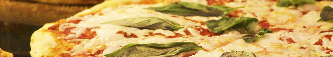 Eating Italian Pizza at Montebello's Pizzeria & Pasta restaurant in Yonkers, NY.